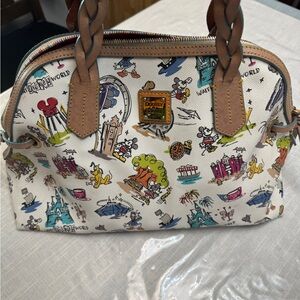Dooney & Bourke White and Tan Satchel with Playful Design